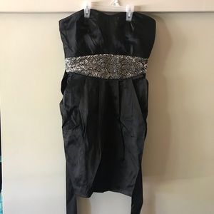 Trixxi Dresses - Black strapless dress with pockets Trixxi Dresses - Black strapless dress with pockets